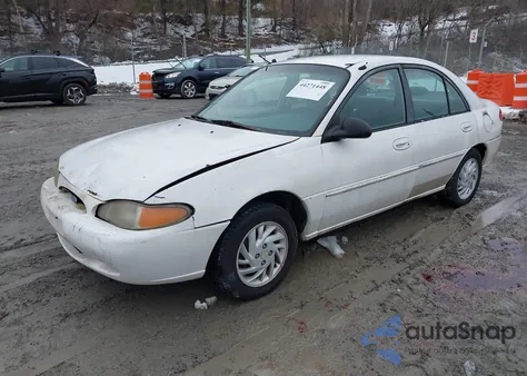 1997 Ford Escort Lx z USA, uszkodzony, nr VIN 1FALP13P6VW409525